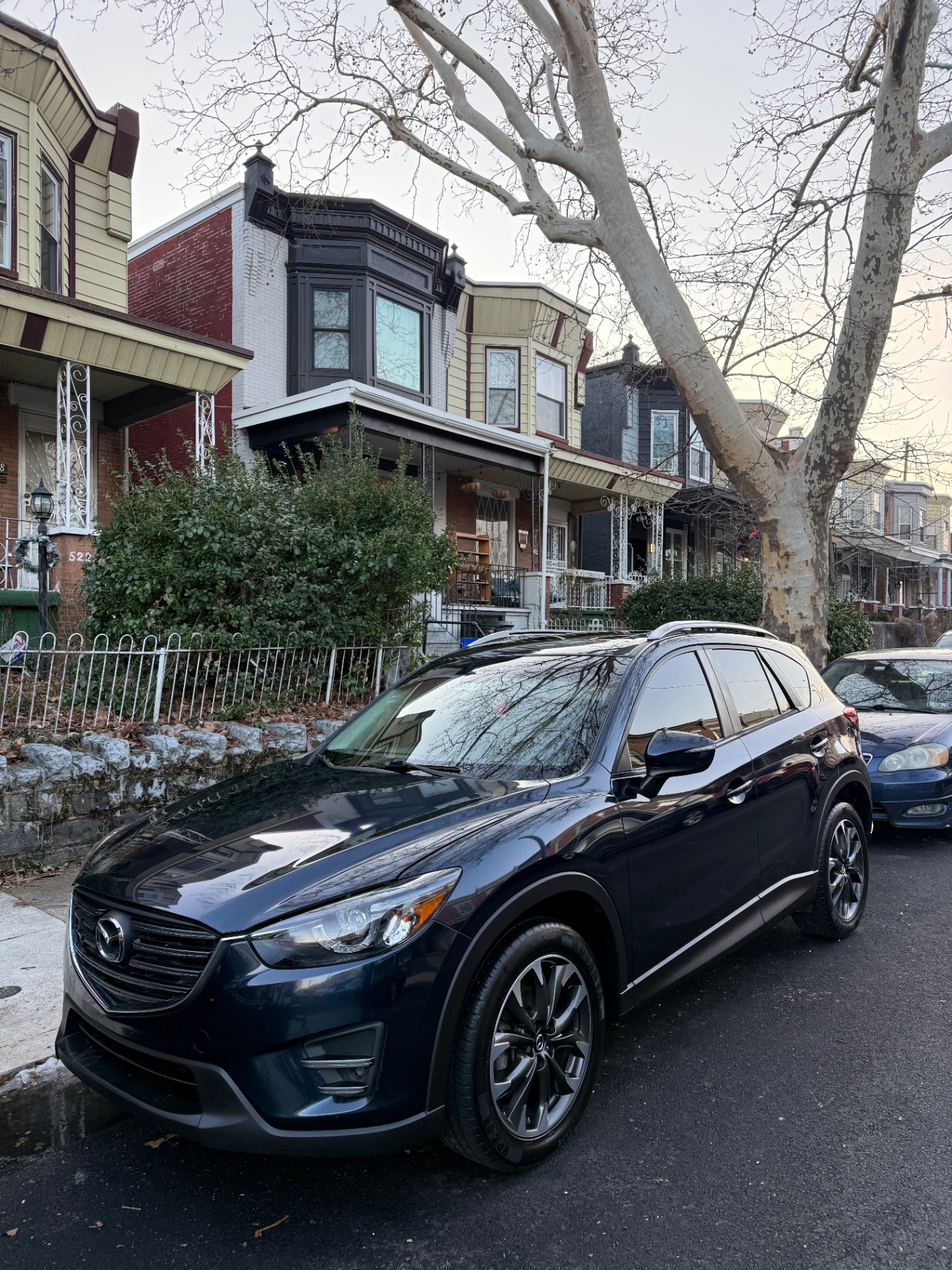 Mazda CX-5 with restored deep blue gloss after detailing